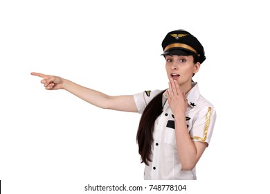 Young Woman In Pilot Uniform Points With Finger Surprised Isolated On White Background