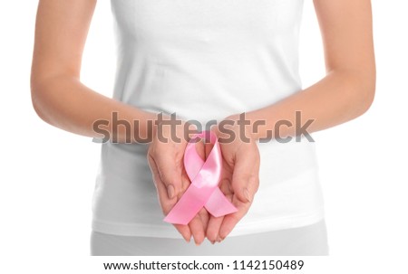 Young woman with pink ribbon on white background. Gynecology