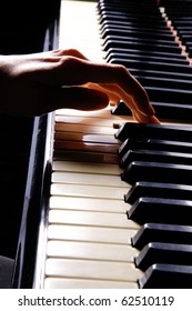 A  Young Woman Playing Piano Closeup