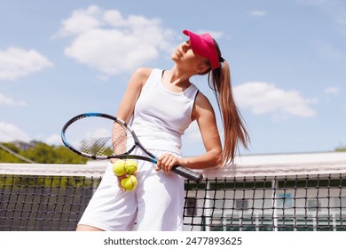 young woman playing tennis on the tennis court, olympic sport, outdoor activity concept - Powered by Shutterstock