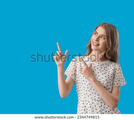 Similar – Pretty woman with OKAY sign, ok gesture. Happy lady, correct choice, yellow wall