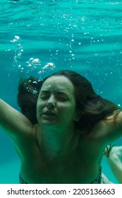 Young Woman In The Pool Underwater, Underwater Shooting