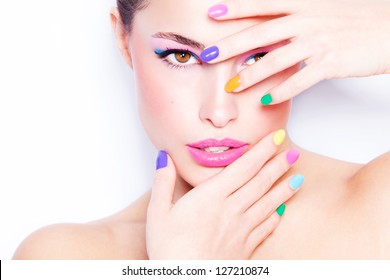 Young Woman Portrait With Colorful Makeup And Nail Polish, Studio Shot