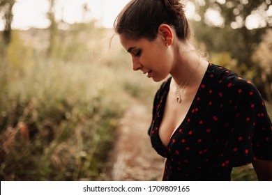 Young woman portrait with dress and beautiful neckline