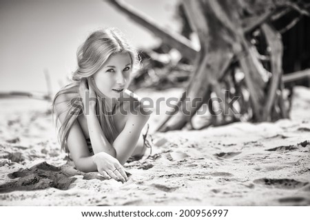 Similar – Junge Frau vor Stranddüne