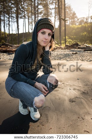 Young Woman Posing on the Olympic Beach in Spring