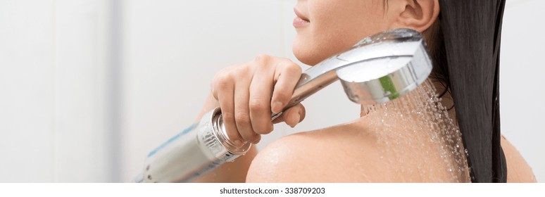 Young Woman Pouring Out With Hot Water From Shower