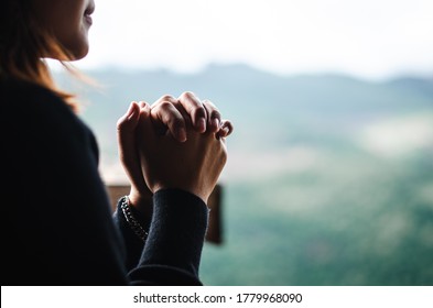 The young woman prayed to God, confessing his sins and hopes of praise to God. - Shutterstock ID 1779968090