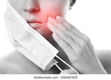 Young Woman With Prevention Mask And Skin Irritation On White Background. Maskne - Acne Breakouts From Wearing A Face Mask.