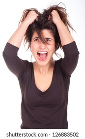 Young Woman Pulling Her Hair And Screaming