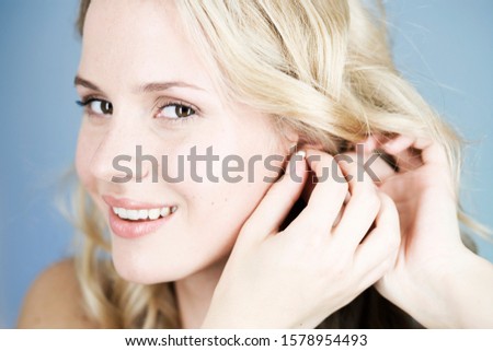 Similar – woman with earring