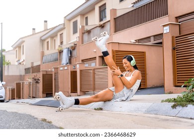 Young woman putting on skates going rollerblading in urban city - Shutterstock ID 2366468629