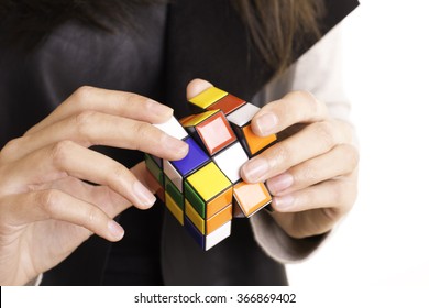 Young Woman With Puzzle Cube