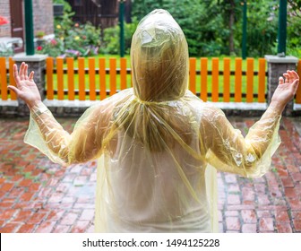 Young Woman With Rain Poncho