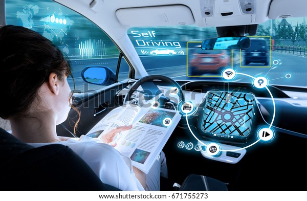 young woman reading a book in a autonomous\
car. driverless car. self driving vehicle. heads up display.\
automotive technology.\
