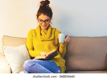 Young Woman Reading In A Room 