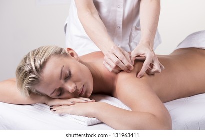 Young Woman Receiving Acupuncture