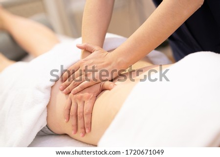 Similar – Female receiving treatment by professional osteopathy therapist