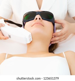 Young Woman Receiving Laser Therapy
