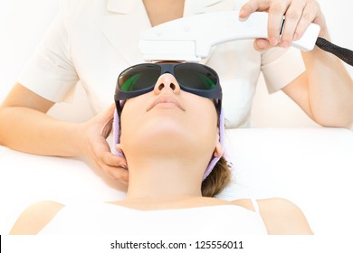 Young Woman Receiving Laser Therapy
