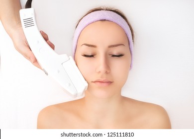 Young Woman Receiving Laser Treatment