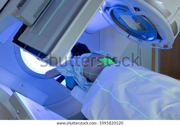 Young Woman Receiving Radiation Therapy Treatments\
for Cancer