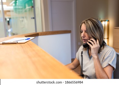 Young Woman At The Reception Of Fitness Club Or Health Centre