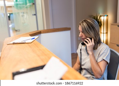 Young Woman At The Reception Of Fitness Club Or Health Centre