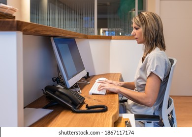 Young Woman At The Reception Of Fitness Club Or Health Centre