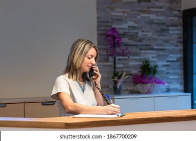 Young Woman At The Reception Of Fitness Club Or Health Centre