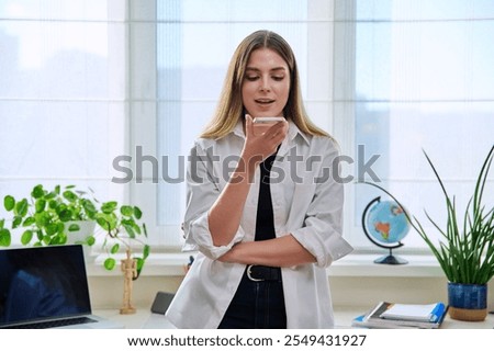 Similar – Image, Stock Photo Young woman recording with smartphone stabilizer outdoors