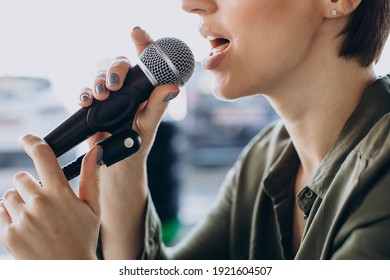 Young Woman Recording Voice Acting At Studio