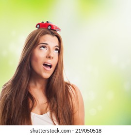 Young Woman With A Red Car Over His Head