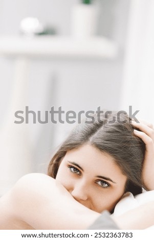 Similar – Portrait of a girl in red dress on a wooden door