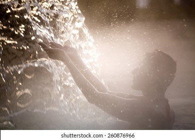 Young Woman Relaxing In Thermal Pool.