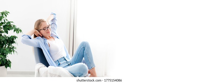 Young Woman Relaxing Under Air Conditioner At Home. Girl Resting On Couch, Enjoying Cool Fresh Air In Cozy Living Room. White Background, Copy Space. Self Isolation, Social Distance In Quarantine.