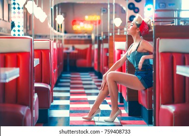 Young Woman In Retro Cafe