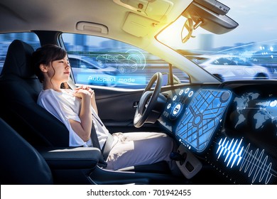 Young Woman Riding Autonomous Car. Self Driving Vehicle.