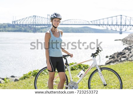 Young Woman Riding Bike outside
