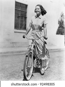 Young Woman Riding Her Bike