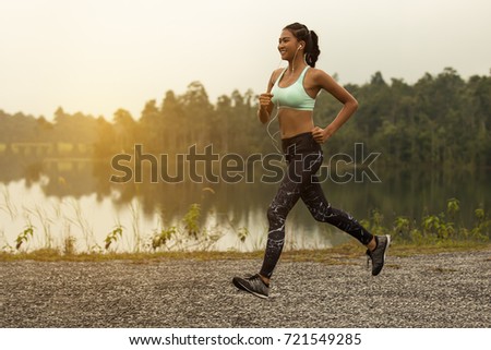 Similar – Fit muscular woman working out in a park