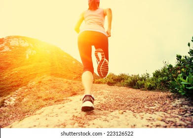 Young Woman Running On Seaside Mountain Stock Photo 223126522 ...