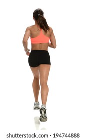 Young Woman Running Viewed From Behind Isolated Over White Background