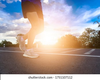 Young woman running for workout in the morning,health and lifestyle concept, with copy space. - Shutterstock ID 1751107112