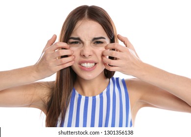 Young Woman Scratching Face On White Background. Annoying Itch