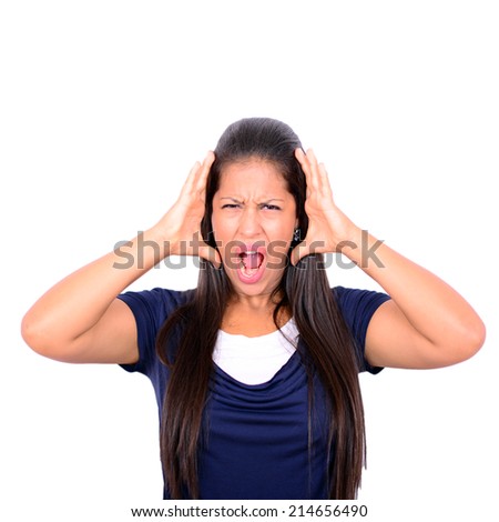 Young woman screaming with hands on head against white background