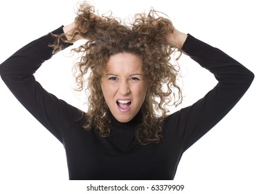 young woman screaming and pulling her hair