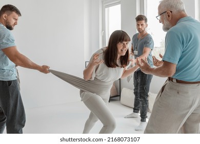 Young Woman Screaming Releasing Her Anger On Group Therapy