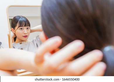 Young Woman Setting Her Hair