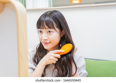 Young Woman Setting Her Hair